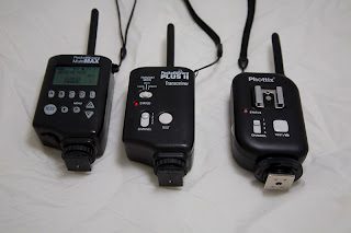 The Phottix Atlas (right) along with the PocketWizard MultiMax (left) & the Plus II (middle)
