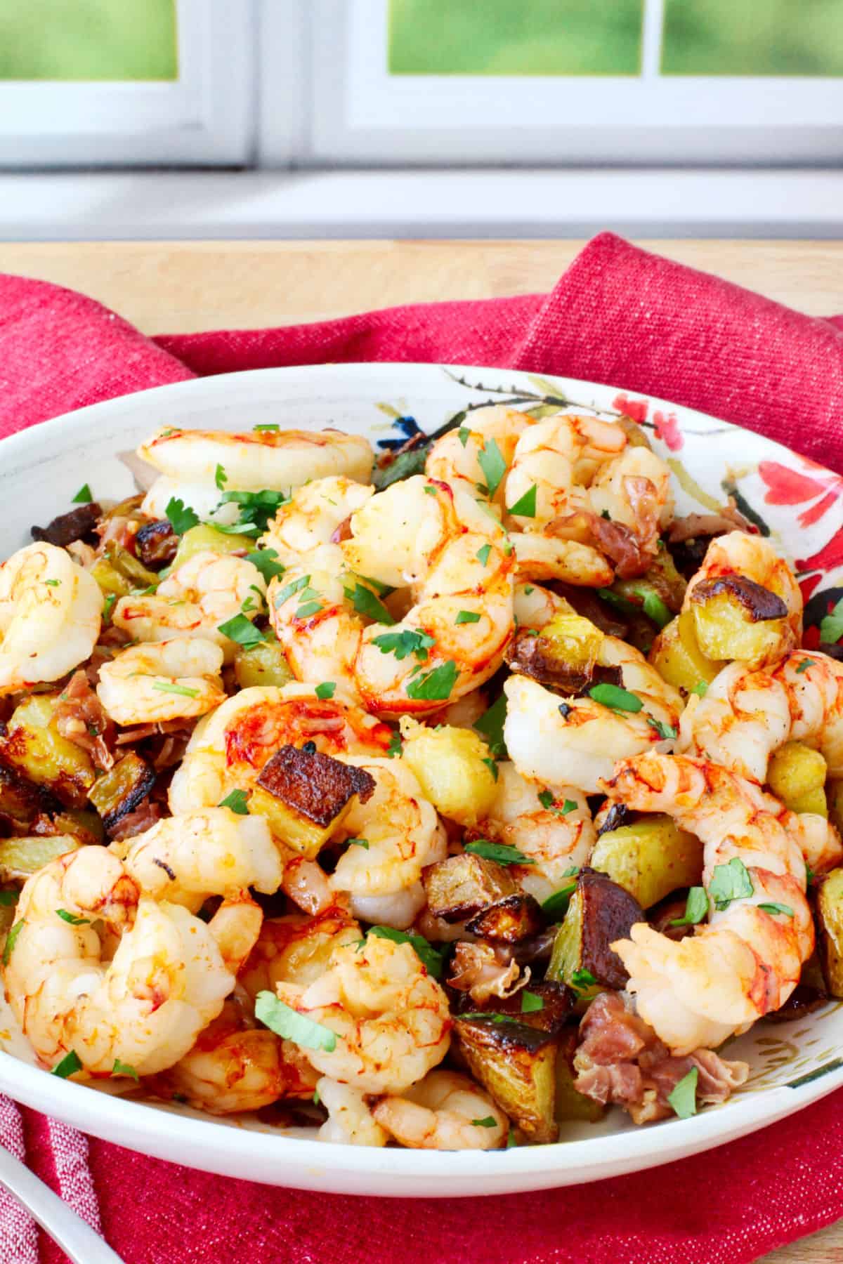 Sheet Pan Shrimp, Roasted Potatoes, & Prosciutto in a bowl.