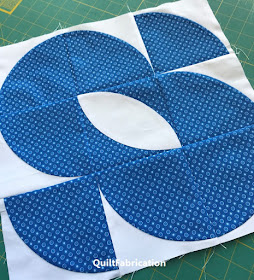 round robin project center from leftover blocks at QuiltFabrication