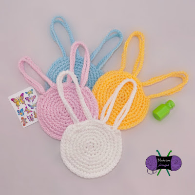 http://www.ravelry.com/patterns/library/bunny-head-treat-bag