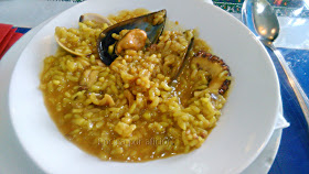 Arroz meloso con alcachofa, marisco y pulpo