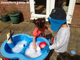 Children playing at water table