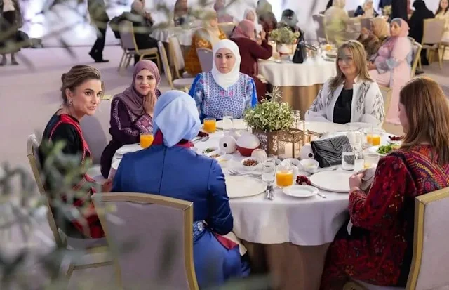 Queen Rania wore a red palestinian traditional embroidery tatriz dress. Pink diamond earrings. Governor Firas Faour