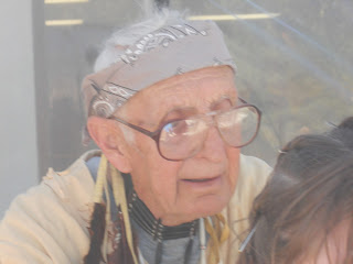 Bandana, beads, and feathers