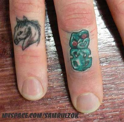 Pony With Biti Finger Tattoo Designs tattoo am finger