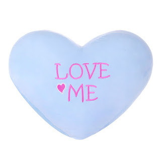 pastel colored heart shape pillows