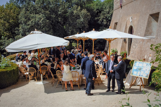 happy people are dining all together during a wedding party