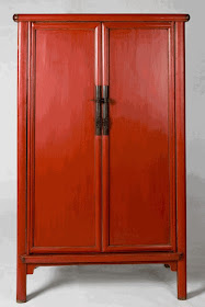 Orange asian armoire from the Silk Road Connection
