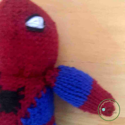 Picture of close up of the spiderman on the right side