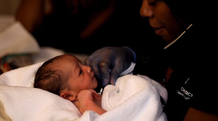 Woman with new-born baby