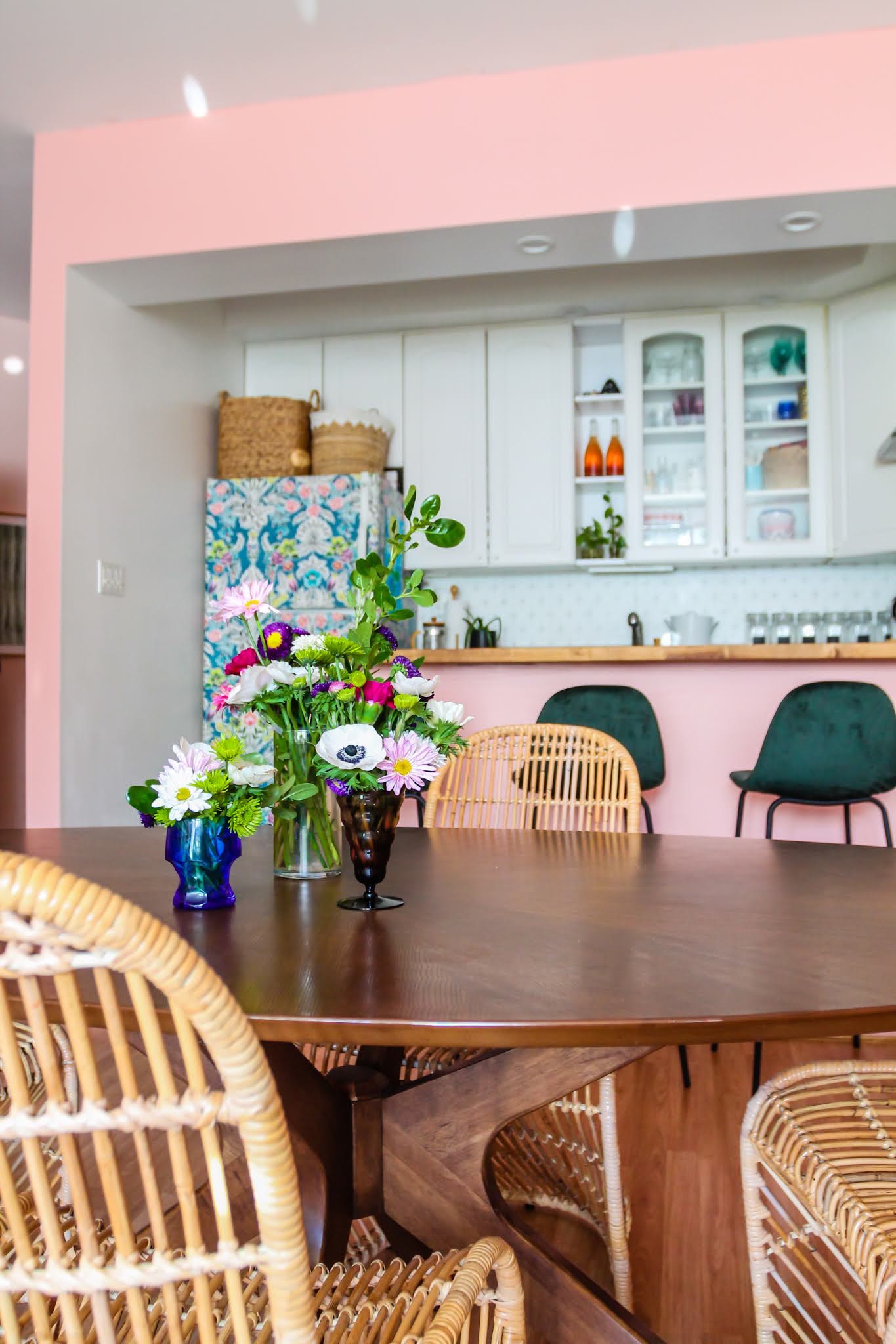 pink and green decor // green barstools // pink kitchen // diy wallpaper fridge // pink and green kitchen // colorful homes // Megan Zietz  Apartment // TfDiaries // pink and green room // pink and green Inspo // barstool inspo // velvet barstools // in mod Sigfred barstool // Green Velvet Mid Century Barstools // pink kitchen // pink room // boho decor