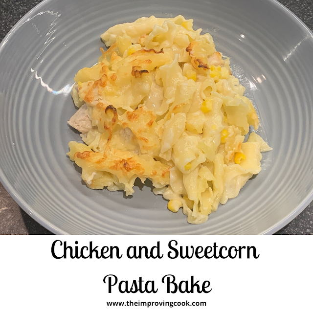 A grey bowl containing chicken and sweetcorn pasta bake with text overlay.