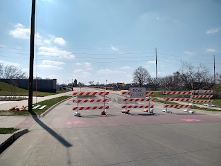 street approaching bridge, with Road Closed signs