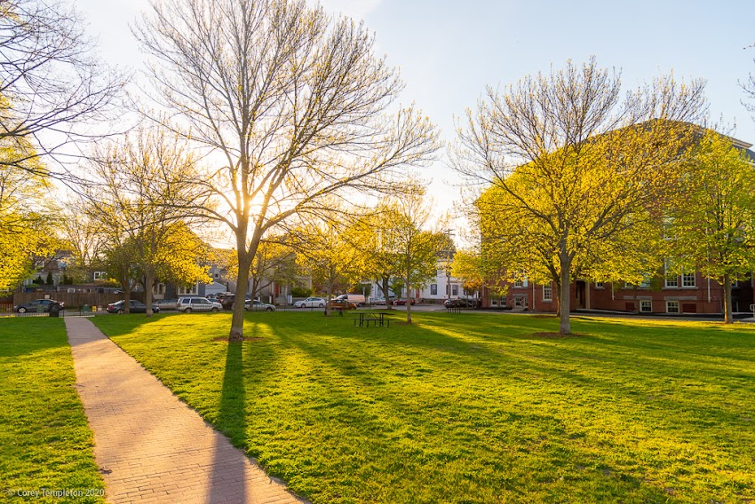 Portland, Maine USA May 2020 photo by Corey Templeton. A sunny morning in Fort Sumner Park. Looking back towards North Street instead of out towards the rest of the city.