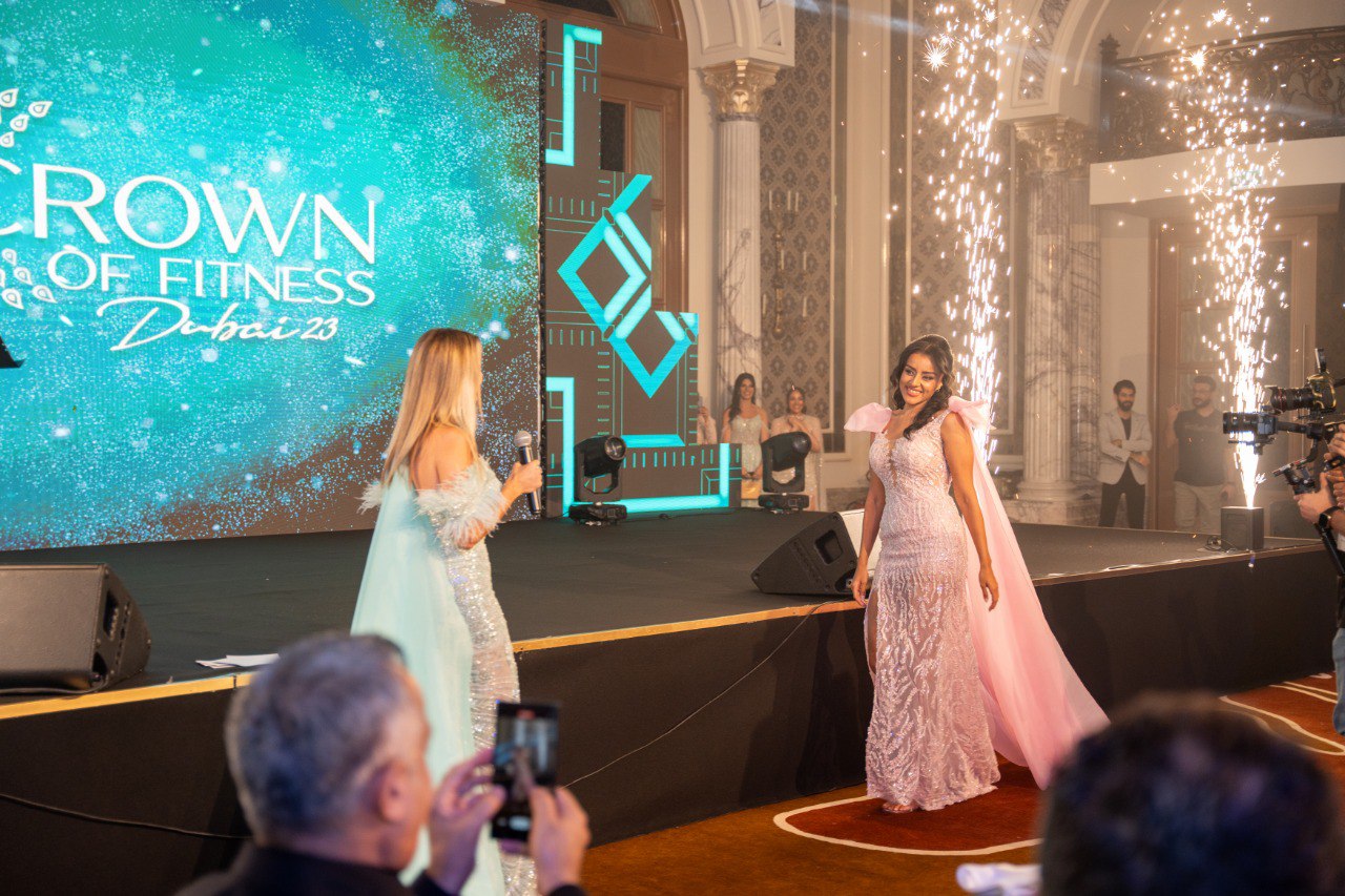 Sarah Khefaji from Egypt Wins the Arab Crown of Fitness Dubai 2023 In a groundbreaking moment for the United Arab Emirates, Sarah Khefaji, a young Egyptian with a captivating voice and remarkable talent, has emerged as the winner of the Arab Crown of Fitness Dubai 2023. The prestigious competition, organized by ISense and managed by Iman Abu Nakad in collaboration with poet Saham Al Sha'sha, marks the first time the event has been held in Dubai after six successful years in Beirut, under the patronage of Sheikha Fatima Bint Hashr Bin Dalmouk Al Maktoum.    The grand event, held at the Habtoor Palace Hotel on the shores of the Arabian Gulf, was organized in partnership with the BSC Center, led by Dr. Haytham Fawwal, a specialist in obesity surgery, and the White & Black Company. The event adhered to all the official laws and regulations of the host country.    A Panel of Experts Evaluates and Selects   The ceremony, hosted by Lebanese media personality Liliane Naassi, began with the national anthems of Lebanon and the UAE, followed by an introduction to the esteemed judging panel. The panel consisted of renowned doctors and surgeons from the Arab world, as well as leading figures in the field of fitness and health.    The panel members included Dr. Sabah Al Ashqar from the UAE, Dr. Haytham Fawwal from Lebanon, Dr. Abdul Salam Al Ta'i from the UAE, Dr. Sultan Al Tamayat from Saudi Arabia, Dr. Mohamed Diaa Serhan from Egypt, Dr. Yasser Al Jibouri from Iraq, Dr. Saqr Al Ma'ala from the UAE, Dr. Mohamed Abu Arabi from the UAE, Dr. Bassem Al Halabi from the UAE, Dr. Mustafa Ibn Zahr from Morocco, Mrs. Mirna Younes, and Mr. Abdullah Jamal Abdullah from the UAE.    Introduction to the Contestants   The event began with an introductory video showcasing the 11 contestants who represented Lebanon, the United Arab Emirates, Saudi Arabia, Kuwait, Qatar, Jordan, Syria, Iraq, Tunisia, and Algeria. The video highlighted their transformation from obesity to fitness, symbolizing the journey from despair to hope, health, and a vibrant life.    The contestants made two appearances on stage. The first showcased vibrant summer and spring-inspired outfits, while the second featured royal evening gowns designed by the talented Lebanese fashion designer Nada Al Aour.    Another informative video was presented, introducing the event's sponsors and the prizes that would be awarded to the winner of the Arab Crown of Fitness Health Award, as well as the runner-ups and other honorary awards.    A Night of Musical Delight   The event was attended by celebrities, business figures, and media personalities, along with many distinguished guests. The captivating Lebanese artist Salim Assaf mesmerized the audience with his soulful voice and enchanting melodies. He performed his new song titled "Qalbi Hadeed" (My Heart is Iron) and later delighted the crowd with a rendition of his famous hit song "Jamalo."    Other performances included the Syrian singer Farah Youssef, who gained fame after participating in the second season of the Arab Idol program in 2013. She captivated the audience with her live performance, showcasing her versatility in both Arabic and Western music.    As a surprise highlight of the evening, the Kuwaiti contestant Rahaf, formerly a member of the band "Guitara," performed her song "Ya Ghali Anshaghel Bali." Additionally, the Egyptian contestant Sarah Khefaji delivered a stunning performance with her authentic Egyptian singing style.    Honoring Those Deserving Recognition   During the event, Dr. Ayed Al-Qahtani, a renowned surgeon from Saudi Arabia and one of the most esteemed experts in the Arab world in the field of obesity surgery, was honored. He was presented with the Arab Crown of Fitness Health Award (ACOF Health Award) by Mariam Othman, the chairperson of the Rashed Foundation for People of Determination.    Recognizing the importance of media and the role of social media platforms in shedding light on personal journeys of overcoming weight issues and societal bullying, the Influencer Fitness Award (IFA) was introduced. Dr. Yasser Jibouri presented the award to the influential Iraqi personality Jihan Al-Hashem.    Questions and Conclusion of a Healthful Evening   As a healthy body resides in a healthy mind, a segment of questions was included to assess the awareness, understanding, and perception of the contestants regarding the significance of the competition and the importance of combating obesity and spreading awareness.    The titles awarded to the winners are as follows:   1. 1st Runner Up: Celine Naimeh (Lebanon)  2. 2nd Runner Up: Hala Samawi (Jordan)  3. Miss I did it: Mariam Khaled (Egypt)  4. Miss Photogenic: Dr. Marah Al-Atarash (Saudi Arabia)    In conclusion, the Arab Crown of Fitness Dubai 2023 was a remarkable event that celebrated health, fitness, and personal transformations. Sarah Khefaji's win as the Arab Crown of Fitness is a testament to her talent, dedication, and commitment to promoting a healthy lifestyle. This event showcased the power of determination and the positive impact of fitness on individuals and society as a whole.