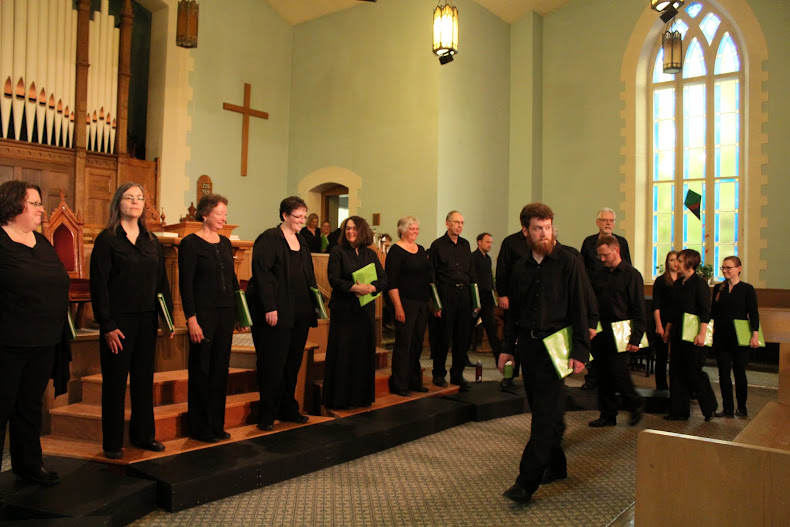 Stairwell Carollers enter for concert at Almonte United