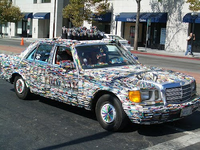 The old 1981 Mercedes Benz coverd with pens and this great artwork is 