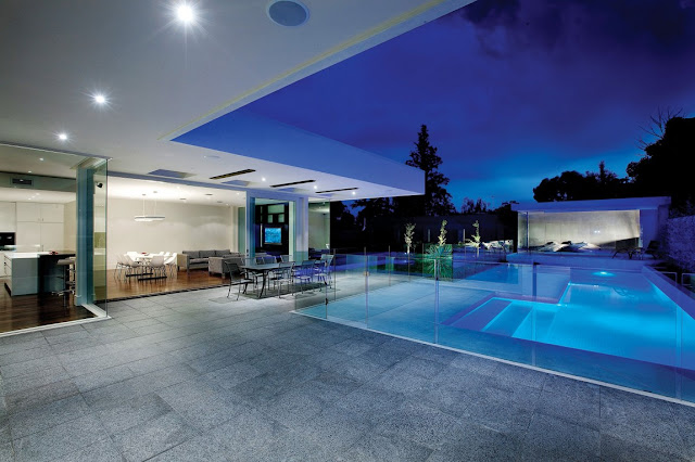 Large terrace of modern home at night 