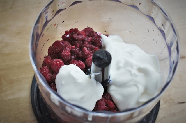 Second layer: raspberries + sour cream