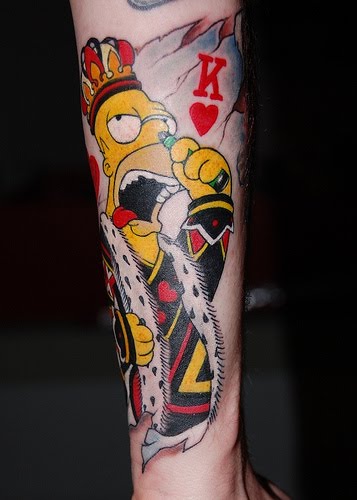 Playing card inspired design on forearm