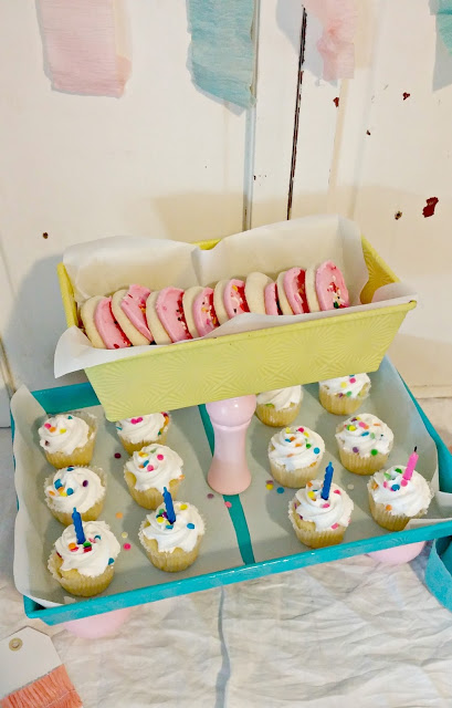 Use some old baking pans to create a fun tiered serving tray!