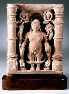 Vamana, Vishnu’s dwarf avatar, who by his unsuspected ability to grow to gigantic size won back the celestial kingdom for the gods after they had been driven from it by the Daitya Bali. Stone sculpture, eleventh century. Bharat Kala Bhavan, Banaras Hindu University.