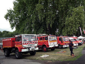 Rural fire brigade vehicles on display at an agricultural show.  Indre et Loire, France. Photographed by Susan Walter. Tour the Loire Valley with a classic car and a private guide.