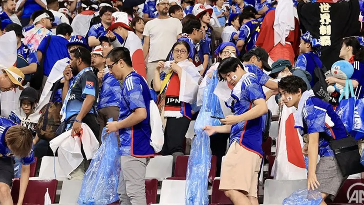 Japan fans clean up the stands after World Cup 2022 matches