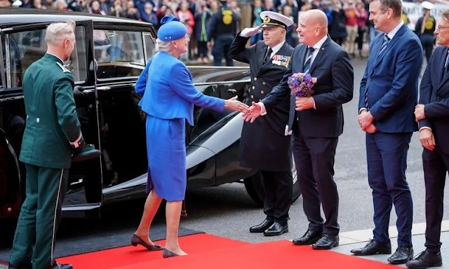 Crown Princess Mary wore an ivory tweed midi dress by Mark Kenly Domino Tan. Gianvito Rossi and Diane von Furstenberg