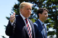 U.S. President Donald Trump and Canadian Prime Minister Justin Trudeau, shown here at a G7 meeting in June, have clashed in recent months. At one point, Trump threatened to drop Canada from a NAFTA rewrite and make a trade deal with Mexico alone. (Credit: Leon Neal/Getty Images) Click to Enlarge.