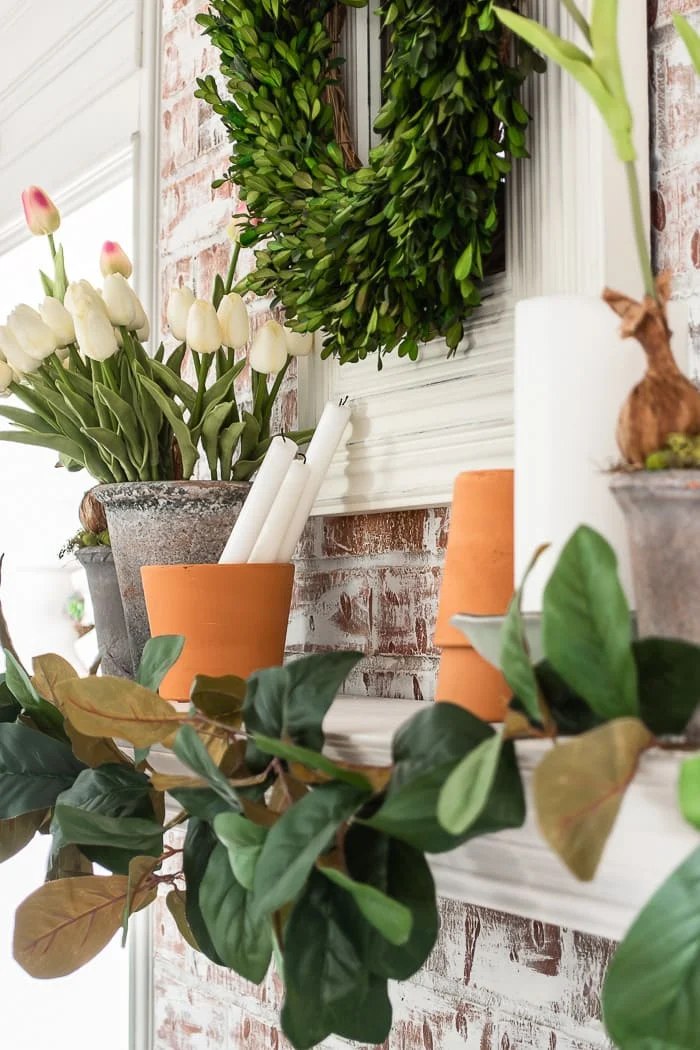 Spring mantel with flower pots