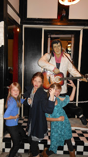 the girls with Elvis statue