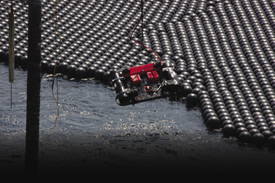 NASA's C-OPS System in the Black Ball Covered Los Angeles Reservoir - Source: NASA - https://spinoff.nasa.gov/Spinoff2012/ee_1.html