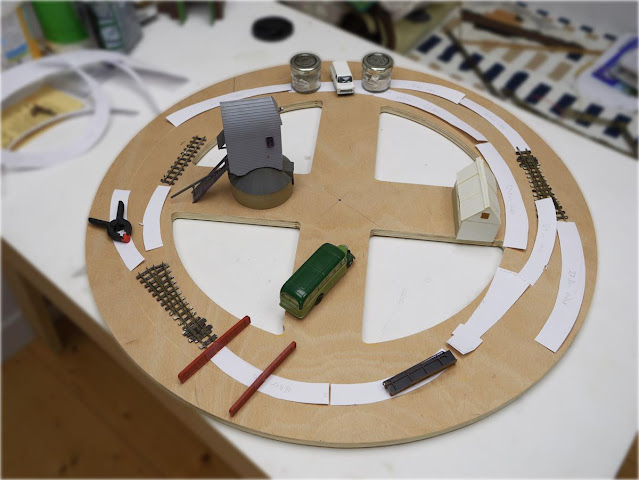 One mock-up showing a potential trackplan - comprising of a run-around loop, kick-back, and siding.