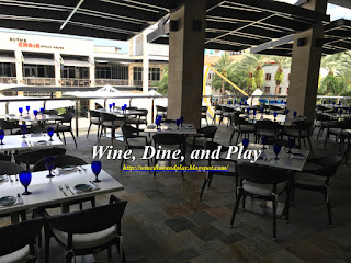 The patio at the Sea Salt restaurant in St. Petersburg, Florida looks out onto the Sundial Mall and other restaurants and shops