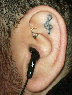 behind ear tattoos for girls. Michael has eleven tattoos in