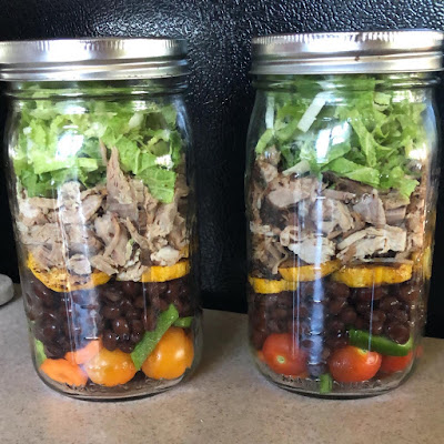 mason jar salad with black beans and pork