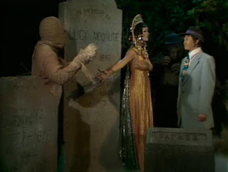 Spencer faces Queen Forah and a mummy in the cemetery in The Ghost Busters (1975).