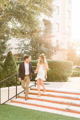 couple walking down steps at The Alfond Inn