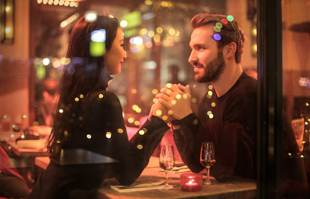 photography of couple holding hands