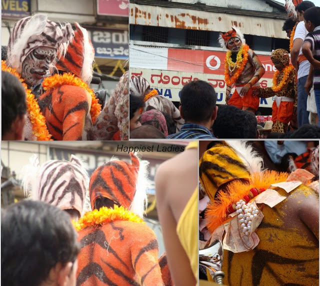 Huli Vesha is men dressed in tiger mask and body paint