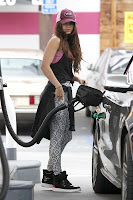 Vanessa Hudgens  Fuels up her new car at a gas station