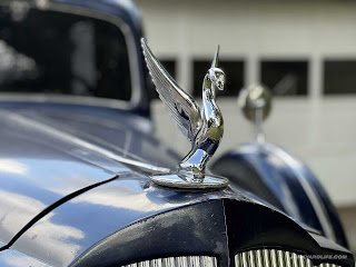 1936 Packard Eight hood ornament is a chrome swan