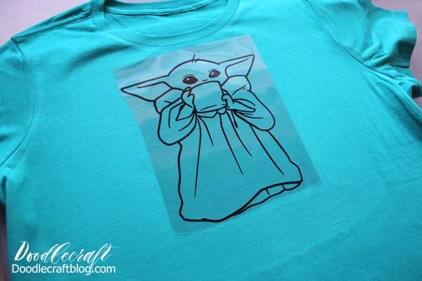 Use the Cricut Maker to cut iron-on vinyl of the Child, or baby yoda, on a shirt.