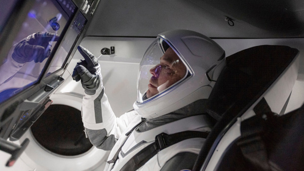 Inside SpaceX's Crew Dragon capsule, NASA astronaut Bob Behnken prepares for launch on the historic Demo-2 mission...which lifted off for the International Space Station on May 30, 2020.