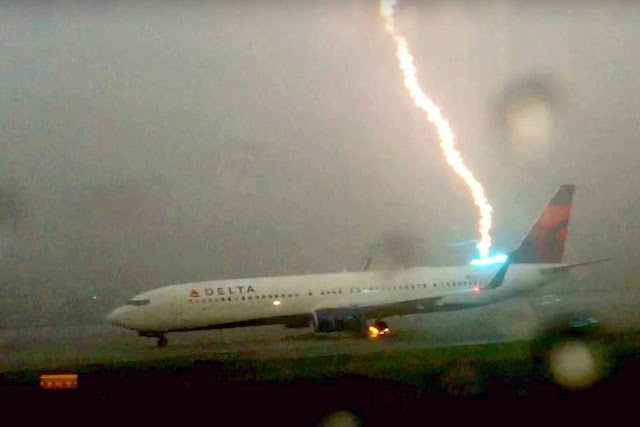 Plane hit by lightning on runway