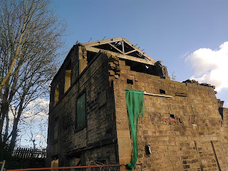 <img src="Wardle Tannery.jpeg" alt=" image of derelict mill in wardle" />