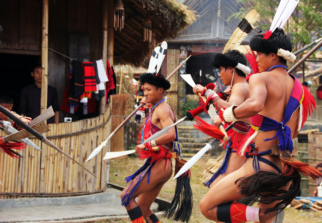 Young Lotha Naga Men In Traditional Attire Playing Traditional Games at Hornbill Festival 