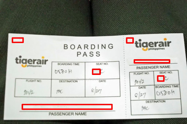 manually written tiger air boarding pass for a manila to tacloban flight