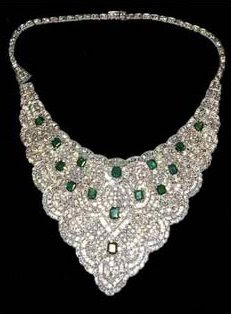 Imeldaâ€™s diamond choker with 15, 5 cts. each Colombian emeralds , 75 ...